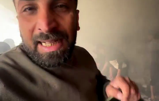 Thumbnail preview image for the video titled: Horrified civilians attempt to retrieve victims of Israeli bombing of an UNRWA clinic