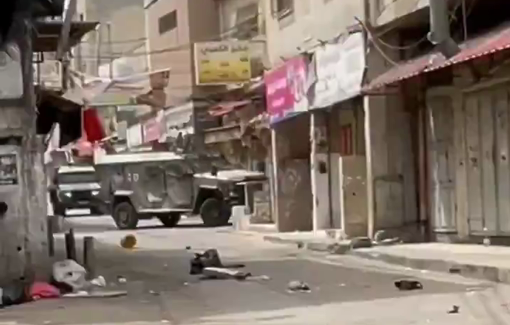 Thumbnail preview image for the video titled: Israeli forces fired towards young Palestinian men throwing rocks at them in Nablus