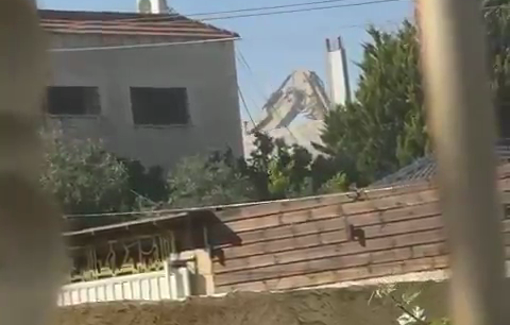 Thumbnail preview image for the video titled: Israeli bulldozer demolishing the home of the family of martyrs Hammam and Harith Hashash