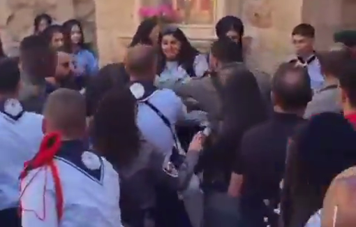 Thumbnail preview image for the video titled: Christian scout threatened with a gun in Jerusalem during Easter celebrations