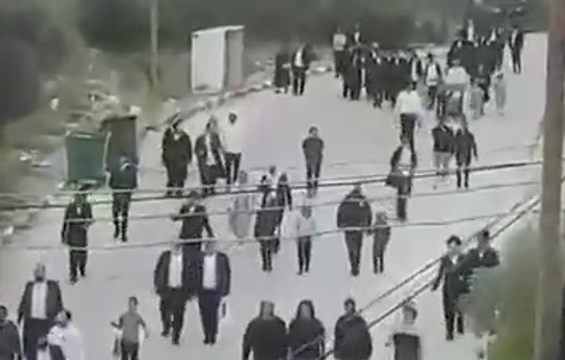 Thumbnail preview image for the video titled: Israeli settlers storm the center of Kifl Haris provoking resident by dances