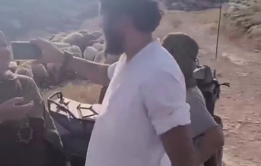 Thumbnail preview image for the video titled: Armed Jewish settlers and soldiers assault Palestinian farmers and women in the Al-Khalayel area of Al-Mughayyir