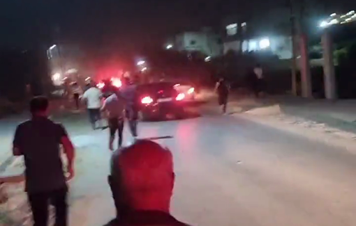 Thumbnail preview image for the video titled: Residents from inside Bruqin rushed to confront the settlers and rescue families from the burning homes