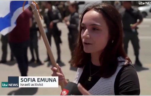 Thumbnail preview image for the video titled: Israeli woman blocks aid trucks, wants to kill all children