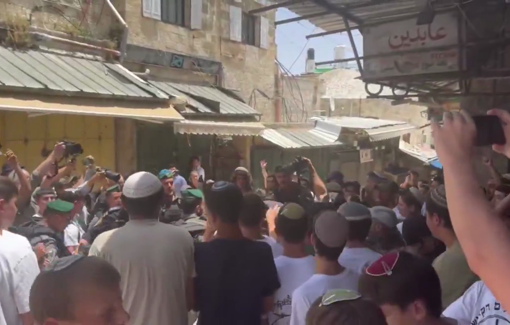Thumbnail preview image for the video titled: Ultranationalist Israeli settlers chant “death to Arabs” and “may your village burn” at Palestinians in Occupied East Jerusalem