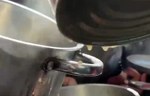 Thumbnail preview image for the video titled: Children forced to scrape the bottom of pots to survive