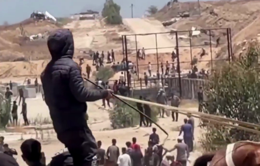 Thumbnail preview image for the video titled: Israeli tanks on a hill overlooking the Netzarim GHF militarized "aid" site