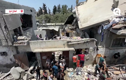 Thumbnail preview image for the video titled: Neighbors search for victims after Israel bombed the Al-Saloul family house