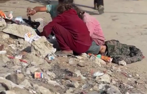 Thumbnail preview image for the video titled: Little girls search through the trash