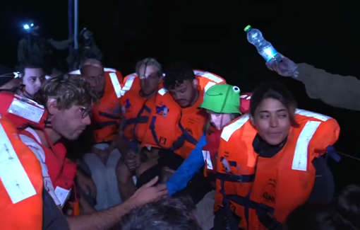 Thumbnail preview image for the video titled: In a propaganda move, Israeli soldiers film themselves giving food to the Madeleen crew, illegally detained in international waters