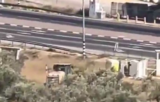 Thumbnail preview image for the video titled: An Israeli military bulldozer closes a dirt road near the town of Haris, in the central occupied West Bank