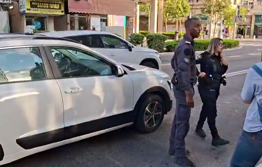 Thumbnail preview image for the video titled: An Israeli policewoman tells demonstrators in Haifa that the text "Stop the War" is illegal