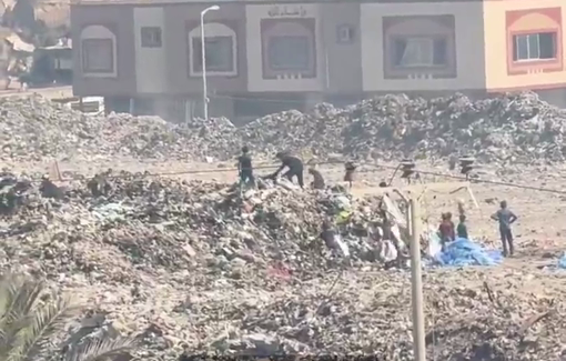 Thumbnail preview image for the video titled: Children rummage through garbage dumps instead of playing or being at school