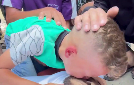 Thumbnail preview image for the video titled: Children mourn their father who was killed while seeking aid for them at the Netzarim GHF site