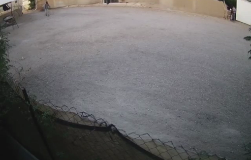 Thumbnail preview image for the video titled: In Kafr Malik, dozens of settlers invaded the village, throwing stones, spraying graffit and burning vehicles