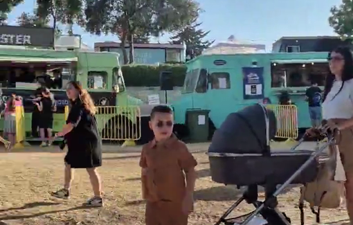 Thumbnail preview image for the video titled: A food truck festival takes place in Jerusalem while food truck aid is blocked from entering starving Gaza