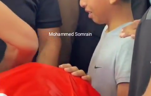 Thumbnail preview image for the video titled: The son of Khamees Ayad bids his father a last goodbye after he was killed by settlers arson