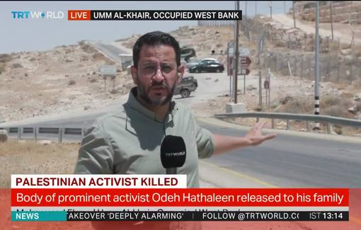 Thumbnail preview image for the video titled: Israeli forces bar mourners from attending the funeral of Palestinian activist Awdah Hathaleen