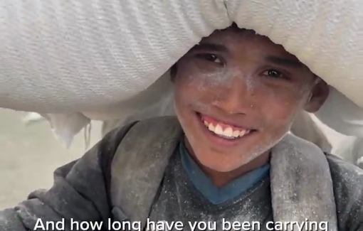 Thumbnail preview image for the video titled: 14 y/o Jamal carries a 25kg flour bag to feed his siblings