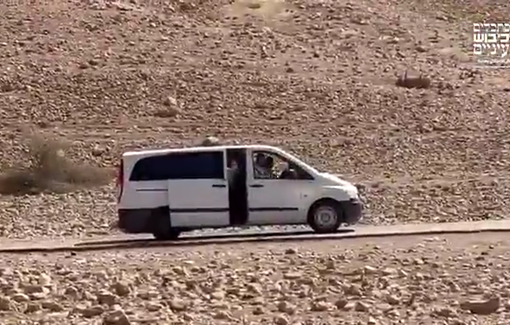 Thumbnail preview image for the video titled: Israeli settlers drive on Palestinian land to provoke and terrorize