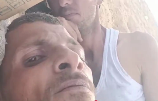 Thumbnail preview image for the video titled: Aid seekers lie down unable to move safely under Israeli gunfire and drones in northern Gaza