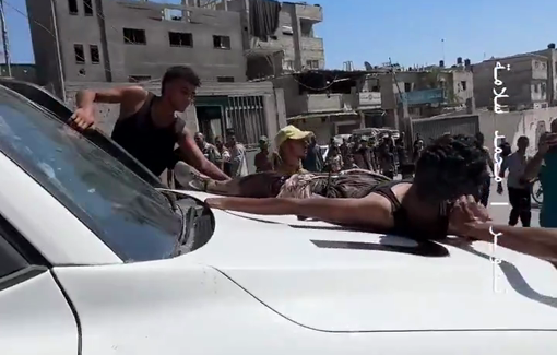 Thumbnail preview image for the video titled: WFP carries a wounded Palestinian on the hot hood of their car