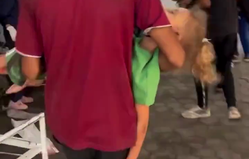 Thumbnail preview image for the video titled: Child carries his injured brother in his arms