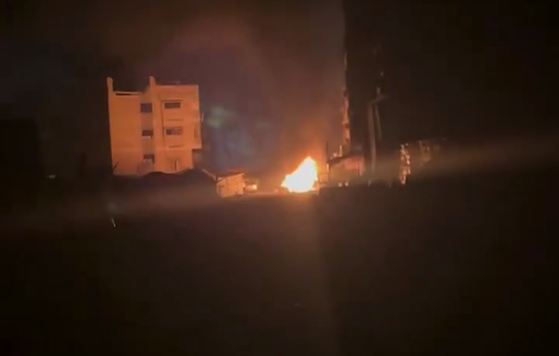Thumbnail preview image for the video titled: Civilian car on fire following an Israeli strike next to Al-Shifa hospital