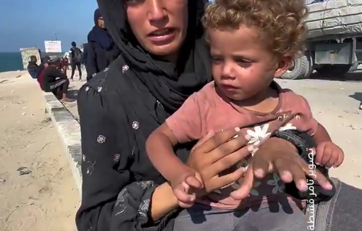 Thumbnail preview image for the video titled: Young displaced mother and her child sleep on the street