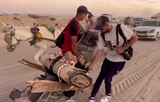 Thumbnail preview image for the video titled: Elderly Palestinian on a wheelchair on the trail of forced displacement from northern Gaza