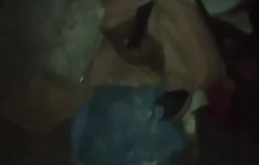 Thumbnail preview image for the video titled: Children sleep on the ground after long hours of forced displacement on foot