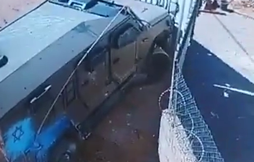 Thumbnail preview image for the video titled: An IDF armored vehicle forced the gate of a Palestinian property before soldiers assaulted the owner