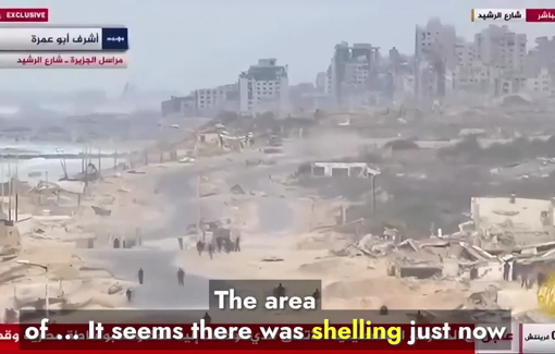 Thumbnail preview image for the video titled: Israeli artillery shells Al-Rashid Street banning Palestinians from returning to Gaza City