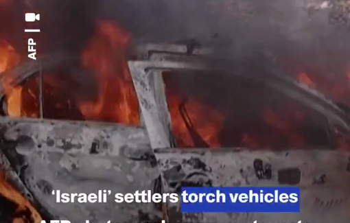 Thumbnail preview image for the video titled: A mob of armed Israeli settlers stormed the Palestinian village of Beita torching Palestinian vehicles and terrorizing residents.