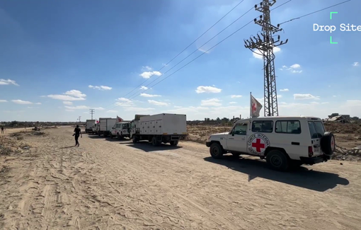Thumbnail preview image for the video titled: Refrigerated trucks and ICRC vehicles waiting at the Kissufim crossing to return 45 Palestinian bodies