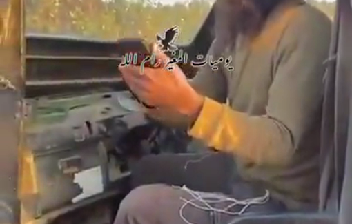 Thumbnail preview image for the video titled: Israeli settler prevents Palestinian residents from harvesting olives in their land of Al-Mughayyir