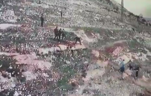 Thumbnail preview image for the video titled: Army-backed Israeli settler attack local Palestinian families in Khallet Al-Natsh area