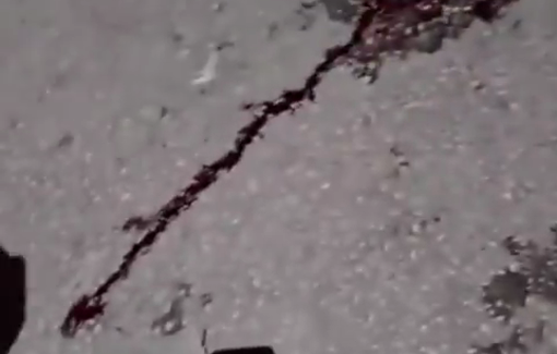Thumbnail preview image for the video titled: Blood from Ahmed Saed Zyoud stains the street where Israeli soldiers shot him