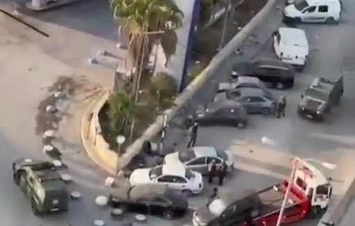 Thumbnail preview image for the video titled: Israeli forces seize a vehicle during their ongoing raid on the town of Kafr Aqab and Qalandiya camp