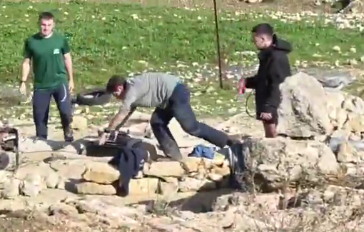 Thumbnail preview image for the video titled: Four settlers pump and emptied a water cistern of the Palestinian community of Hirbat al-Nabi, a few