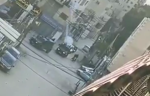 Thumbnail preview image for the video titled: Israeli forces heavily fire tear gas canisters in the Qalandia R.C. streets