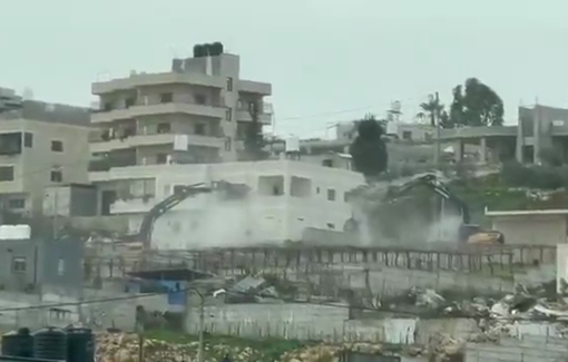Thumbnail preview image for the video titled: Israeli Hyundai esxcavators demolishing Christian Bethlehem homes, in Al-Khader