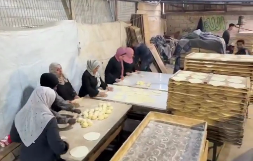 Thumbnail preview image for the video titled: Widows and the injured during the genocide baking together to feed families in Gaza