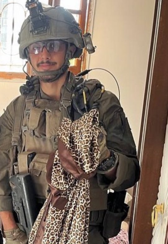 Thumbnail preview image for the video titled: Officers of the Golani Brigade displaying lingerie belonging to Palestinian women in Gaza City