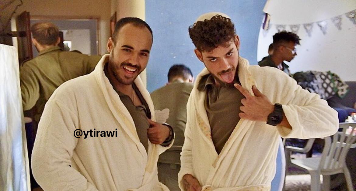 Thumbnail preview image for the video titled: Israeli soldiers wearing bathrobes belonging to displaced Palestinian men and women