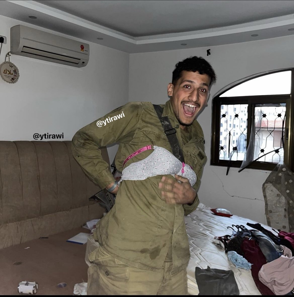 Thumbnail preview image for the video titled: Israeli sergeant from the Combat Engineering Corps -steel cat special unit wearing Palestinian women underwear