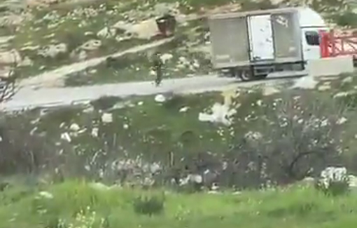 Thumbnail preview image for the video titled: Near Masafer Yatta, soldiers fire to stop vehicles from passing