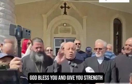 Thumbnail preview image for the video titled: Father Pierre Al-Rai states the people of his community defend their land peacefully by remaining on their land.