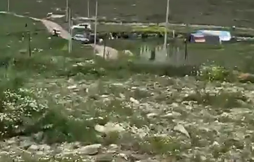 Thumbnail preview image for the video titled: Israeli settlers gather at a new outpost built on the lands of Beit Imrin village, northwest of Nablus