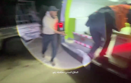 Thumbnail preview image for the video titled: First responders recover the bodies of Palestinians killed by Israel at police checkpoint